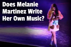 does melanie martinez write her own songs|More.